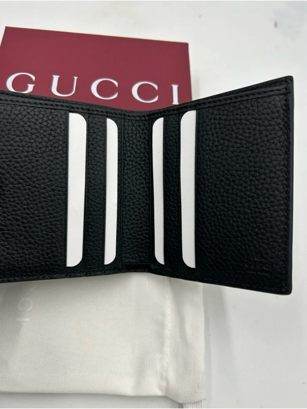 Gucci jumbo GG Leather bifold wallet made in Italy